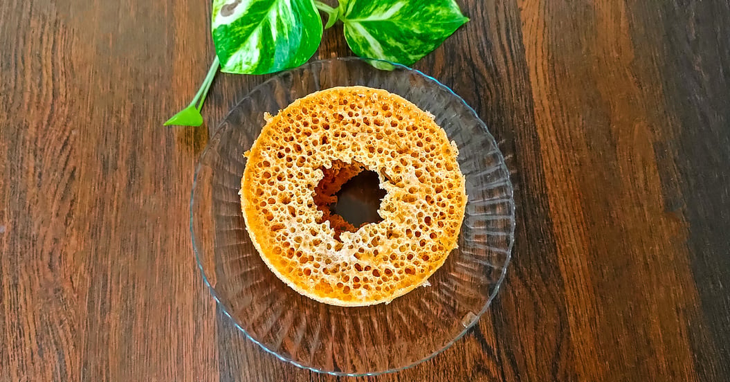 Popular and traditional Indian Rajasthani sweet dessert called Ghevar or Ghewar